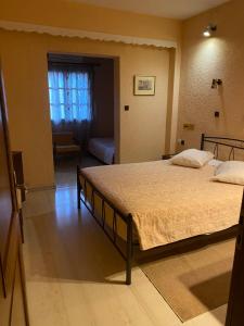 Krevet ili kreveti u jedinici u okviru objekta Olympic Hotel