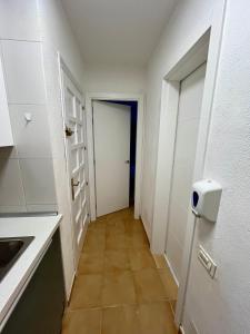 Kuchyňa alebo kuchynka v ubytovaní Las Torres del Castillo, 208Marina
