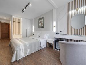 מיטה או מיטות בחדר ב-Hotel Tara Becici