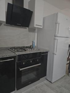 Kuchyň nebo kuchyňský kout v ubytování Maison Indépendante Récente et Climatisée à Kelibia - Quartier Bousten 8min de la plage