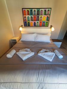 Letto o letti in una camera di 4Rooms Guest House Free Wi-Fi