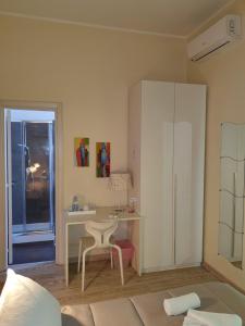 Letto o letti in una camera di 4Rooms Guest House Free Wi-Fi