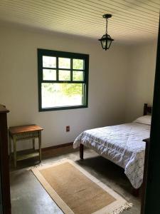 Postel nebo postele na pokoji v ubytování Rancho Cejo