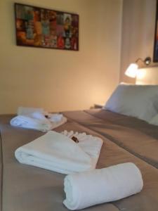 Letto o letti in una camera di 4Rooms Guest House Free Wi-Fi