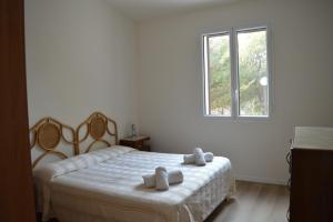 Ένα ή περισσότερα κρεβάτια σε δωμάτιο στο Lovely house with amazing sea view