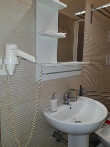 Bagno di 4Rooms Guest House Free Wi-Fi