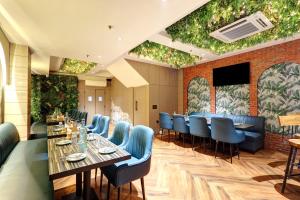Posezení v ubytování Hotel Uptown 1Km Connaught Place