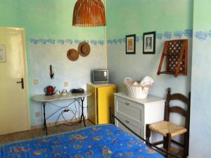 TV a/nebo společenská místnost v ubytování Casa Al Chianti B&B