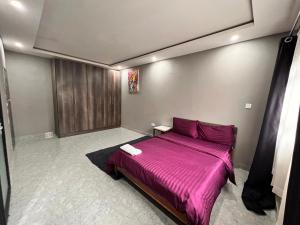 Ένα ή περισσότερα κρεβάτια σε δωμάτιο στο Salama Apartments