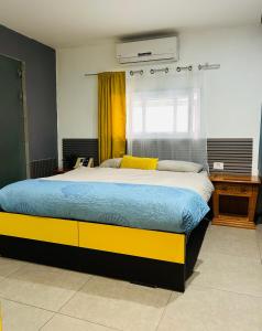 Postel nebo postele na pokoji v ubytování Amdar Hostel
