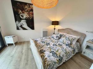Postel nebo postele na pokoji v ubytování Gite de l'estampon