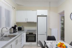 A kitchen or kitchenette at Cozy apartment in Pangrati area!