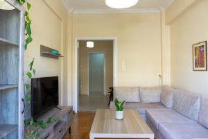 A seating area at Cozy apartment in Pangrati area!
