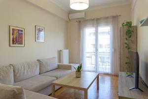 A television and/or entertainment centre at Cozy apartment in Pangrati area!