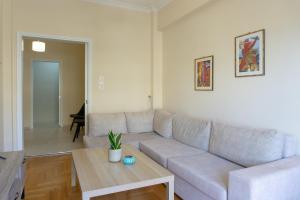 A seating area at Cozy apartment in Pangrati area!