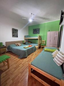 Postel nebo postele na pokoji v ubytování Casa Mboyeré + 31 fotografií