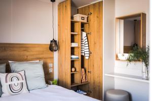 Postel nebo postele na pokoji v ubytování Camping Le Calypso 5 étoiles
