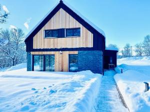 冬天的Apartmány Na výsluní Šumava - U lípy