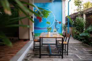 Vrt pred nastanitvijo Gecko Hostel