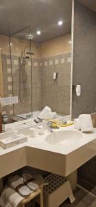 Koupelna v ubytování Hotel Casagrande