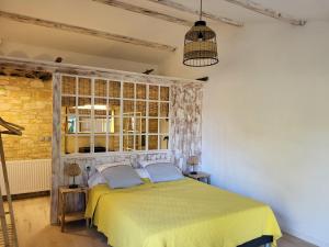 Postel nebo postele na pokoji v ubytování 1 Chambre piscine commune et 1 Gite piscine privée La Sauvasse + 28 fotografií