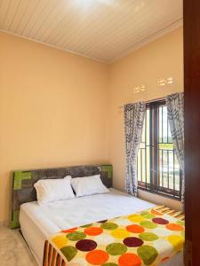 Katil atau katil-katil dalam bilik di Homestay Bukittinggi Agam "NADELS HOMESTAY SYARIAH"