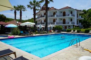 Bazén v ubytování IRIDA Rooms 'n' Pool nebo v jeho okolí