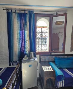 Cama o camas de una habitación en Dar Yakout