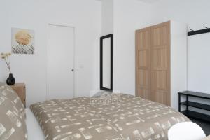 Giường trong phòng chung tại Roomies Luxembourg Centre Gare