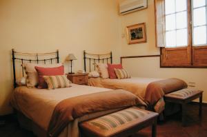 Cama ou camas em um quarto em Robles de Besares