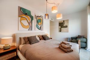 Krevet ili kreveti u jedinici u okviru objekta One80 Suites by Mario