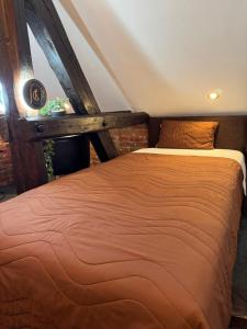 Postel nebo postele na pokoji v ubytování Pirocanac Rest&Rooms top 25