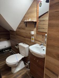 Koupelna v ubytování Pirocanac Rest&Rooms top 25