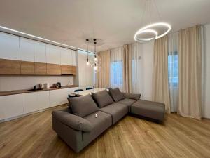 Et opholdsområde på 4City North Apartament 2 rooms