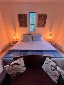 Postel nebo postele na pokoji v ubytování Casa Ake + 22 fotografií
