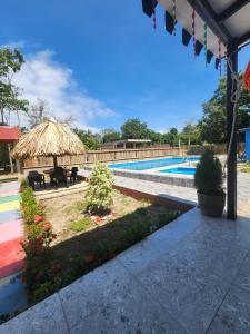 Afbeelding uit fotogalerij van Cabaña con piscina privada in Necoclí