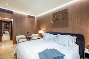 Postel nebo postele na pokoji v ubytování The First Dolce - Preferred Hotels & Resorts