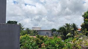 a view of a city with trees and buildings at Casa & Mar in Porto Seguro