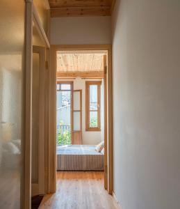 an empty room with a bed and a window at Applehill in Istanbul
