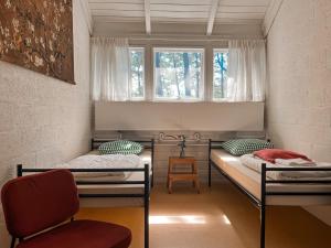 En eller flere senge i et værelse på De Folks