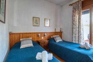 Posteľ alebo postele v izbe v ubytovaní Apartaments Can Niell
