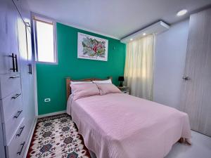 Postel nebo postele na pokoji v ubytování Apartamento con vista única cerca de la Uninorte