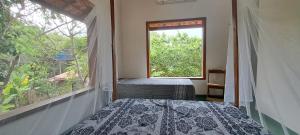 Afbeelding uit fotogalerij van Casa Zero Sete - Praia de Algodões - Apto Árvores in Marau