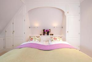 Postel nebo postele na pokoji v ubytování Benendikenwai 11