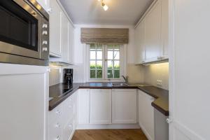 Kuchyň nebo kuchyňský kout v ubytování Benendikenwai 5 + 15 fotografií