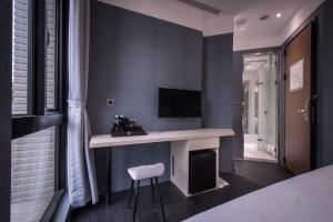 TV a/nebo společenská místnost v ubytování Yi Su Hotel-Taipei Ningxia