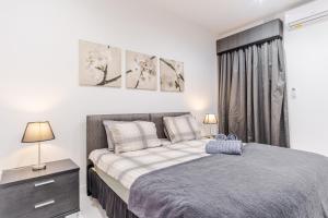 Postel nebo postele na pokoji v ubytování Spacious Mellieha 3BR Apartment with Big Balcony and Prime Location