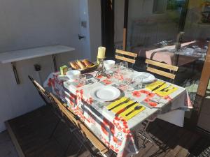a table with a plate of food on it at Chez Pierrot 2 in Bandol