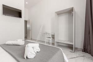 A bed or beds in a room at La Corte dei Pozzi