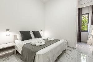 A bed or beds in a room at La Corte dei Pozzi